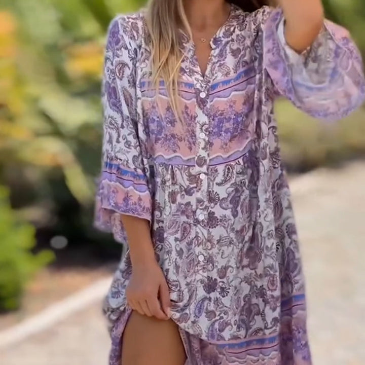 Suelen - Стилна рокля с V-образно деколте и флорални мотиви